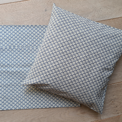 Housse de coussin bleu et gris