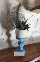 Décoration florale dans oeuf d'autruche