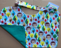 Bavoir motif lions double eponge verte