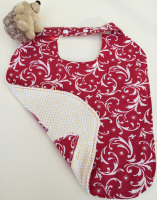 Bavoir motif rouge réversible