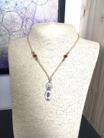 Pendentif féminité