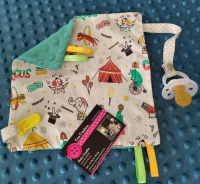 Doudou cirque attache tétine