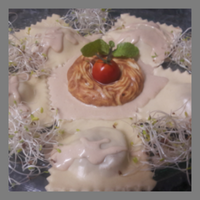 Raviole de canard au porto et noisettes