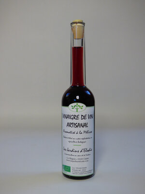 Vinaigre de vin rouge aromatisé à la mélisse