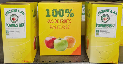 Fontaine à jus de pomme trouble
