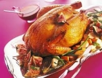 Demi chapon de poulet farci