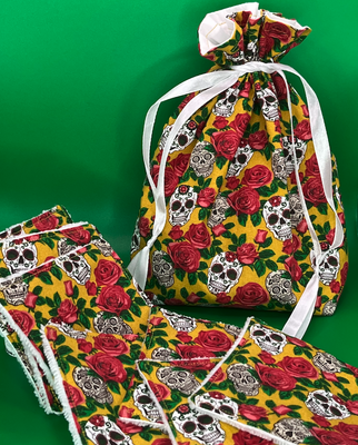 Sac pochon + lingettes têtes de mort