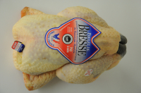 Poulet de bresse de 1.8 kg découpé sous vide.