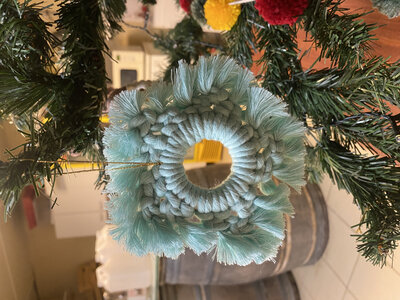 Flocon de neige en macramé turquoise