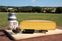 Fromage à raclette 1/2 de meule poivre