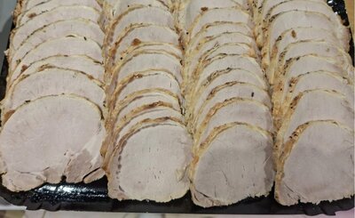 Rôti de porc cuit tranché